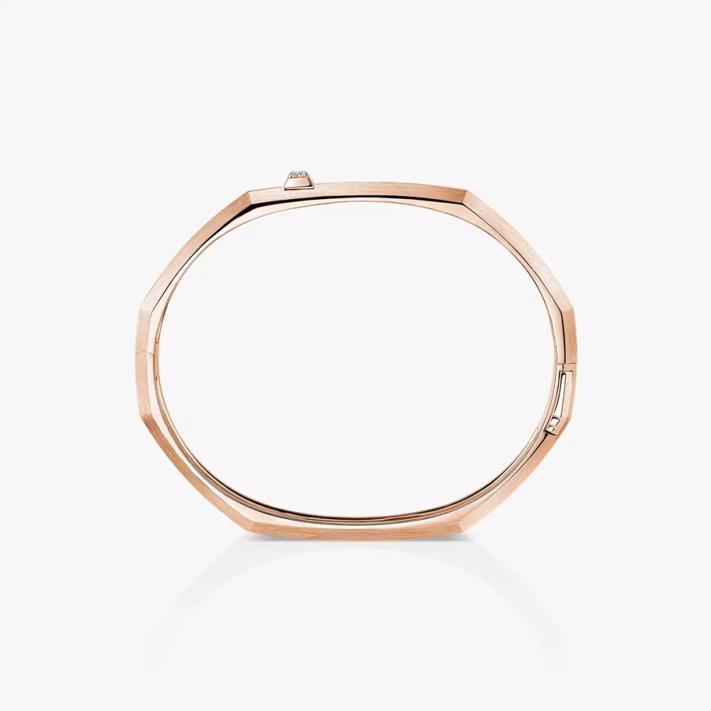 Bracelet Moderniste, moyen modèle Bracelet Moderniste en or rose 18 carats, serti d'un diamant taille brillant. Finition polie miroir sur le dessus.