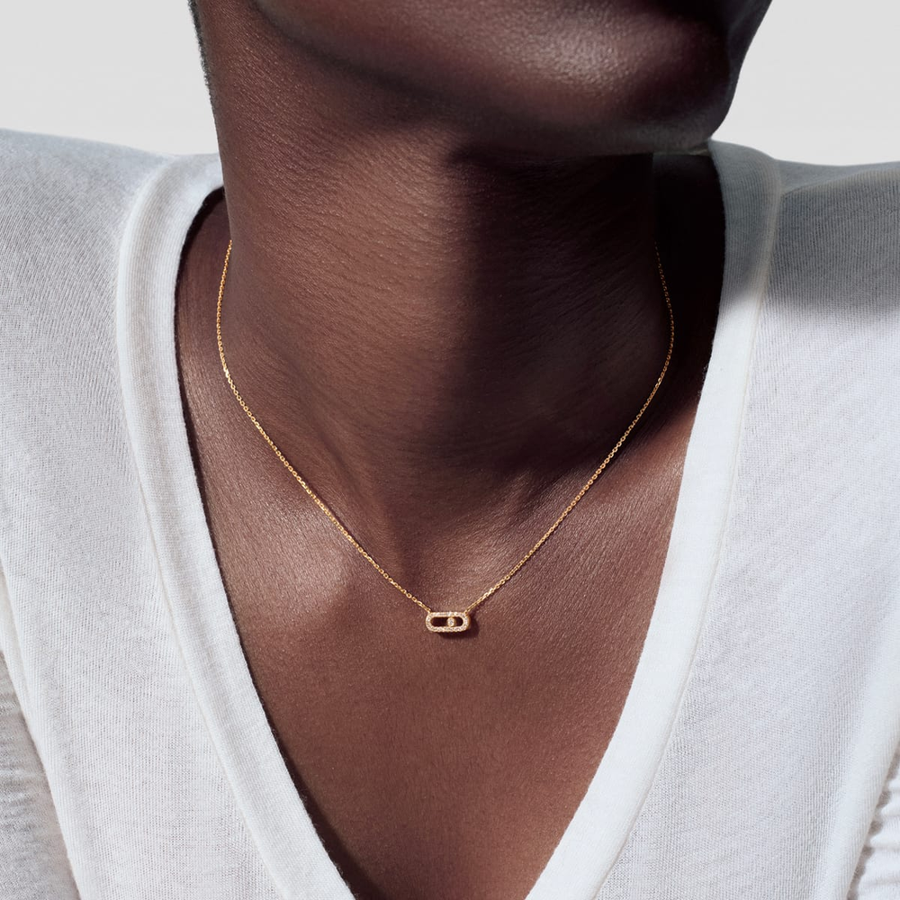 Collier Move Uno pavé, mini modèle Collier Move Uno en or jaune 18 carats, motif serti de diamants taille brillant et d'un diamant mobile en son centre.